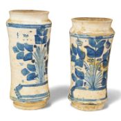 Two similar 18th century Spanish maiolica alborelli, probably Turuel, Aragon, tallest 25cm