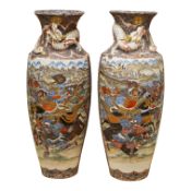 A pair of Japanese Satsuma ‘warrior’ vases, Meiji period, each neck modelled with a dragon, 31cm