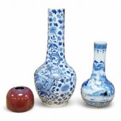 Two Chinese blue and white vases, and a sang de boeuf brush washer, tallest 30cm