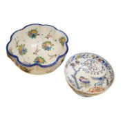 An Italian maiolica punch bowl painted with flowers and masks, and a Davenport Stone China punch