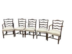 A set of eight Chippendale style pierced ladder back mahogany dining chairs, two with arms