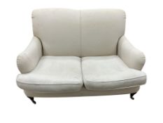 A Contemporary Howard style upholstered two seater settee, width 136cm, depth 96cm, height 88cm