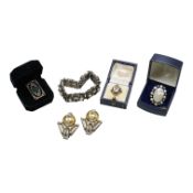 A collection of costume jewls, comprising: an Art Deco silver and paste plaque ring; a pair of Art