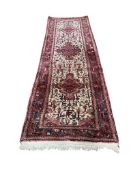 A Kurdish ivory ground runner, 290 x 90cm