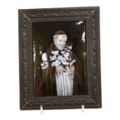 A 19th century Limoges enamel portrait of Saint Francis of Assisi with white lilies, 13cm x 10cm, in