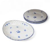 A Meissen oval dish and two plates, outside-decorated in blue enamel, plates 26cm