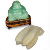 A Chinese white jade pendant and a green stone seated Buddha, on plinth, pendant 7cm