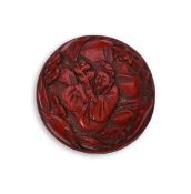 A Chinese cinnabar lacquer seal paste box, 19th century, carved in relief to each side with