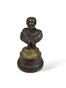 A 19th century French bronze bust of Rousseau, raised on stepped circular base, 15cm high