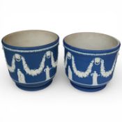 A pair of Wedgwood blue Jasperware jardinieres, 23cm high