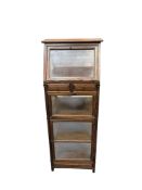 A small glazed hardwood display cabinet, width 38cm, depth 33cm, height 97cm