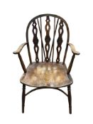 A 19th century ash and elm Windsor elbow chair, stamped Robert Prior, width 50cm, depth 52cm, height