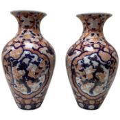 A pair of Japanese Imari vases, Meji period, 48cm high