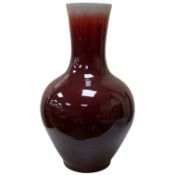 A large Chinese sang de boeuf bottle vase, 68cm high
