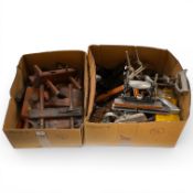 A collection of woodworking planes, including; four combination planes with box sets of cutters,