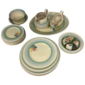 A collection of ‘crocus pattern’ Newport Pottery dinnerware,