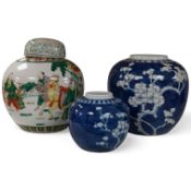 Three Chinese ginger jars comprising two blue and white prunus flower examples and a famille verte