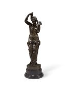 A late 19th century bronze figure of the Venus Anadyomene, raised on stepped ebonised wood base,