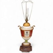 A 19th century French porcelain vase mounted as a table lamp on rouge marble base - 38cm high