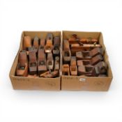 A collection of woodworking planes, including; sixteen beechwood smoothing plains, by Marples, etc.,