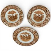A set of three mid 19th century Chinese rouge de fer plates, 20cm diameter