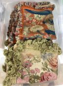Petit-point cushion covers - a pair and a set of three, all tassled, the pair 55x50cm