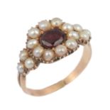 A late Georgian/Victorian garnet and pearl ring, mid 19th century, set with an oval garnet, to a