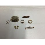 An early 20th century yellow metal, stamped 375, sapphire and diamond chip set ring, size I, an