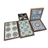 Five framed sets of 18th and 19th century Spanish earthenware tiles, largest 43 x 29cm.