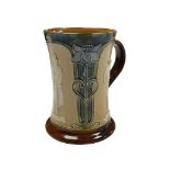 Cycling interest, A Royal Doulton Lambeth Stoneware tankard, circa 1900, the waisted body with three