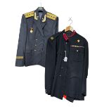 Two military uniforms, a post WWII formal police uniform comprising jacket and trousers with medal