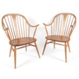 Lucian Ercolani (Italian, 1888-1976) for Ercol: A pair of Model 514 'Cowhorn' elbow chairs