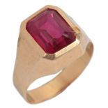 A synthetic ruby ring, Italy, circa 1950, rubover-set with a step-cut synthetic ruby, mounted in