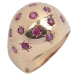 A Retro ruby ring, circa 1940, the gold ring of bombé design, set with circular-cut rubies in star