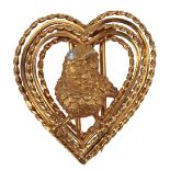 Cartier, a gold and diamond brooch, France, circa 1960, designed as a songbird with a brilliant-