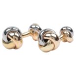 Cartier, a pair of cufflinks, 'Trinity de Cartier', each end composed of interlocking bands in