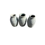 Three small blue garden urns, height 25cm