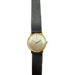 A gentleman's early 1960's 18ct gold Omega manual wind wrist watch, with baton numerals, case