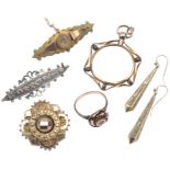 A collection of jewels, 19th century and later, comprising: a gilt metal medallion brooch with a