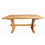 GNOMEMAN: THOMAS WHITTAKER (1912-1991) (LITTLEBECK): AN OAK REFECTORY DINING TABLE the adzed top