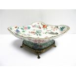 A CHINESE FAMILLE-ROSE BOWL with a hand-painted Jiaqing seal mark, of lobed lozenge form, painted in