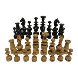 A BOXWOOD & EBONIZED REGENCE PATTERN CHESS SET the kings 7.5cm high, in an Indian carved
