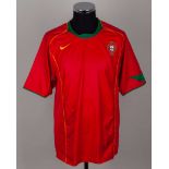 A red and green Portugal International short-sleeved shirt