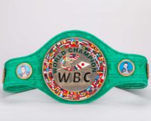A replica WBC belt, with printed photographs of previous winners&nbsp;