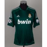 A green replica Real Madrid Champions League short-sleeved shirt