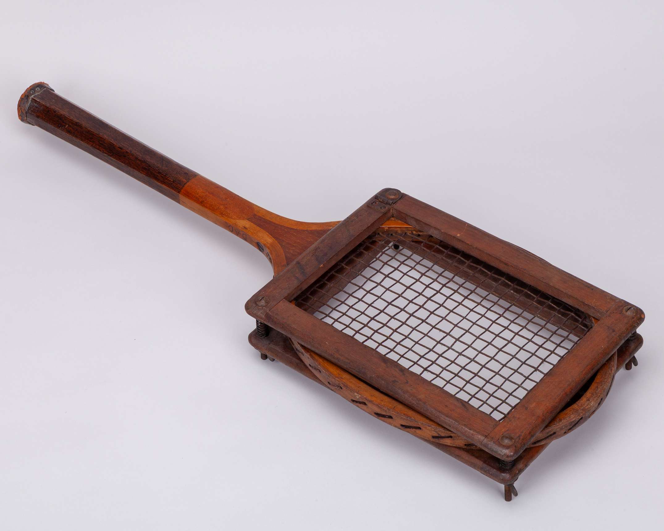 A vintage wooden Club tennis racket