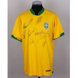 A yellow and green Brazil replica autographed shirt
