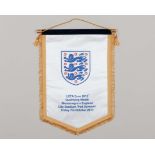 White and blue England v. Montenegro pennant, 2011