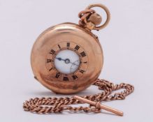A 9ct gold half hunter pocket watch and chain