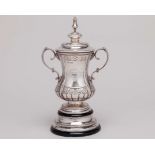 A silver scale-replica of the F.A. Cup trophy